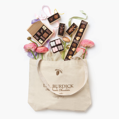 Mother's Day Gift Tote laden with our seasonal and signature chocolate gift box assortments.